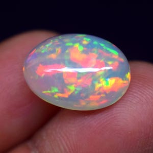 Natural Ethiopian 7.70Carat Galaxy Multi Fire Opal Size 16.8x11.8x7.9MM Oval Shape Opal Cabochon, Gemstone Jeweler