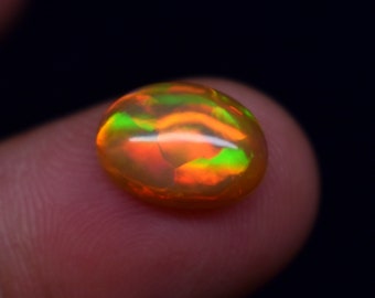 Galaxy Fire Natural Ethiopian Opal Oval Shape 2.20 Carat Ethiopian Opal Cabochon Gemstone Size 11.7X8.5X4.5 mm