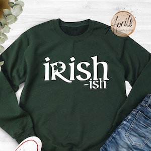 May include: A dark green sweatshirt with the text "irish-ish" in white with a shamrock graphic.