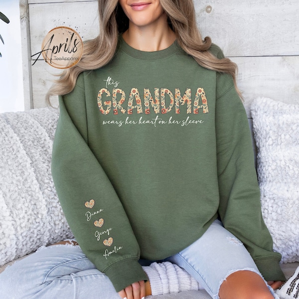 Custom This Grandma Wears Her Heart On Her Sleeve Sweatshirt, Shirt with Names On Sleeve, Mommy Heart Hoodie, Mother's Day Gift