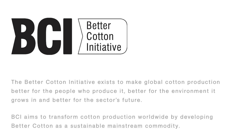 May include: The Better Cotton Initiative logo features the acronym "BCI" in bold black letters, followed by the words "Better Cotton Initiative" in a smaller font. The logo is a white rectangle with rounded corners.