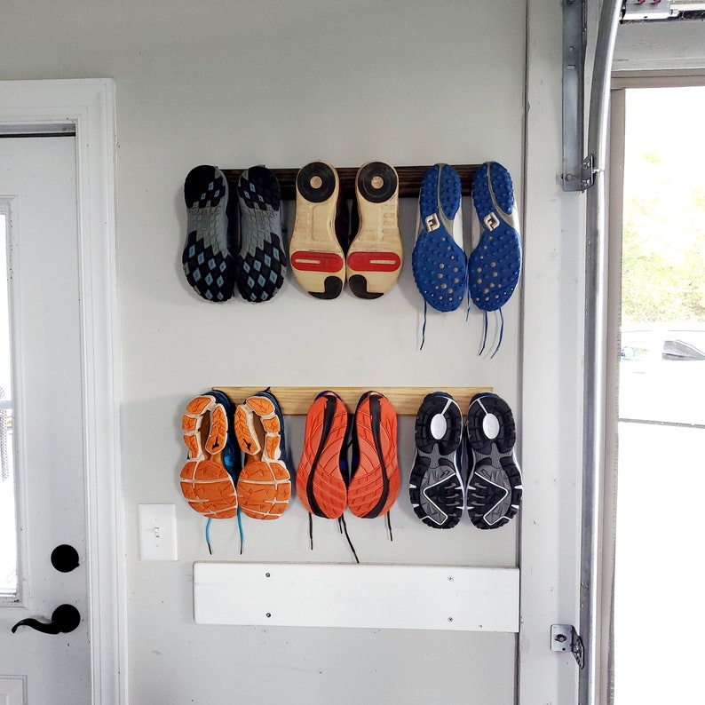 Shoe Rack. Wall Shoe Storage. 4 lengths, holds 2 pairs 5 pairs. Easy install. Hardware included. Free Shipping. Space Saver. Etsy's Pick. 24" - holds 3 pairs