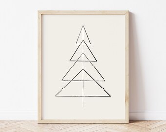 May include: A black and white geometric line art print of a stylized Christmas tree in a light wood frame.