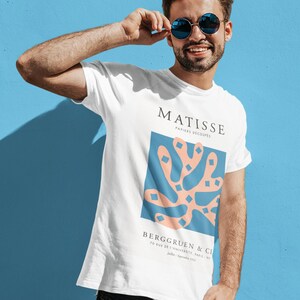 Henri Matisse T-Shirt: Papier Découpé Exhibition Poster (100% Organic Ringspun Combed Cotton) Classic White / Vintage Beige Color Options