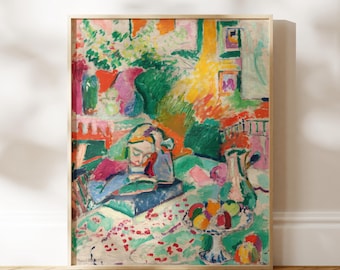 May include: A framed print of a colorful painting featuring a person reading, surrounded by vibrant flowers, fruit, and vases. The artwork uses bold brushstrokes and a rich palette of greens, blues, pinks, and yellows, creating a lively and expressive scene.