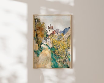 May include: A vertical rectangular wall art print featuring an impressionist oil painting of a rural landscape. The scene depicts a dirt path leading toward a white building with a red roof, surrounded by yellow and green foliage under a cloudy sky.