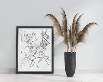 May include: A framed black and white abstract line drawing featuring geometric shapes and intricate patterns. Beside the frame stands a tall, dark gray cylindrical vase filled with several long, feathery brown pampas grass stems.