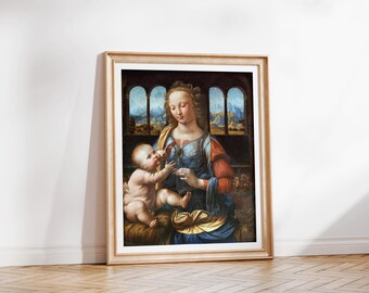 May include: A framed art print featuring a classical painting of a woman in a blue and red dress holding a small child. The scene is set before an arched window looking out onto a landscape with mountains under a blue sky.