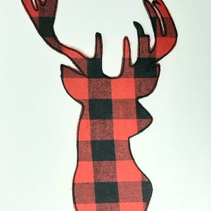 May include: Red and black buffalo plaid deer head cutout.