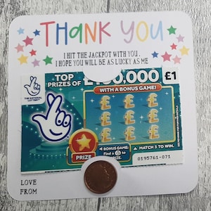 May include: A thank you card with a lottery ticket and a penny. The card says "Thank You" in colorful letters and includes the text "I hit the jackpot with you. I hope you will be as lucky as me."