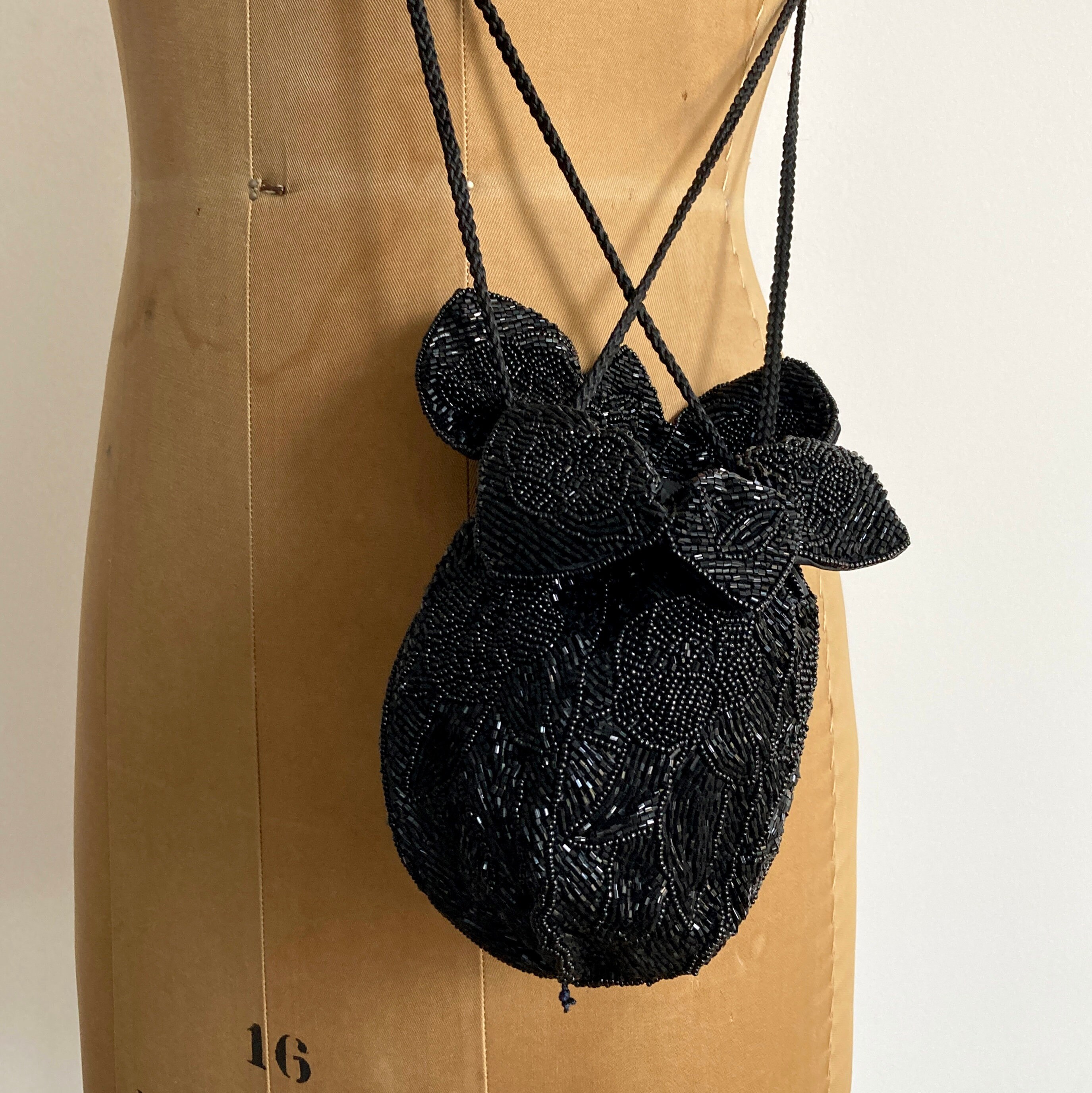 black drawstring evening bag