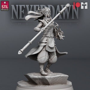 May include: A gray 3D printed miniature of a female elf warrior holding a spear. The miniature is standing on a rocky base. The miniature is part of the Neverdawn Chronicles line of miniatures.