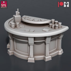 May include: A grey, wooden, circular gaming table with a raised, semi-circular section in the centre. The table has a textured surface and is decorated with four pillars. There are stacks of poker chips and playing cards on the table.
