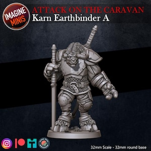 May include: A detailed miniature figure of Karn Earthbinder A, a minotaur-like character from the "Attack on the Caravan" series. The figure is clad in armor and holds a sword, with a second sword on its back. The base is 32mm round.