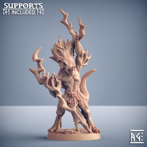 May include: A 3D printed miniature of a humanoid lizard creature with a spiky head and a tail. The creature is holding a staff with a forked end. The miniature is painted in a light brown color.