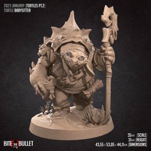 May include: A 3D printed miniature of a turtle-like creature, painted in a light brown colour. The creature is wearing a hooded cloak and holding a staff. The miniature is standing on a round base. The text "BITE THE BULLET" is visible in the bottom left corner of the image. The text "35MM (SCALE)", "31MM (HEIGHT)", and "43.55 x 53.05 x 44.11MM (DIMENSIONS)" is visible in the bottom right corner of the image.