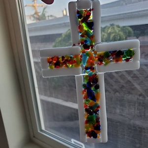 Multicolor fused glass pieces cross with white border