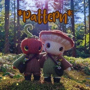 May include: Two crocheted figures, one resembling a tomato and the other a mushroom, stand side-by-side in a forest setting. The tomato figure is red with green accents, while the mushroom figure has a beige cap and brown details. Both figures have large, expressive eyes and small bags. The word "Pattern" is written above.