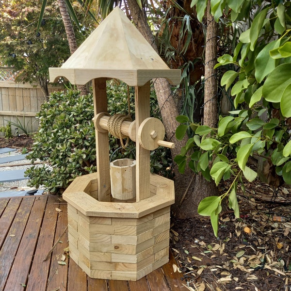 How to build a wooden wishing well with a pyramid roof, a winding winch, and a bucket. Clear plans with step-by-step instructions