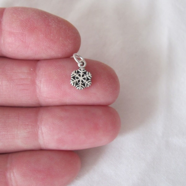 Very small Solid  Sterling Silver Snowflake mini tiny charm. (Brand new)