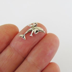 Very small Solid  Sterling Silver Dolphin with calf mini tiny charm. (Brand new)