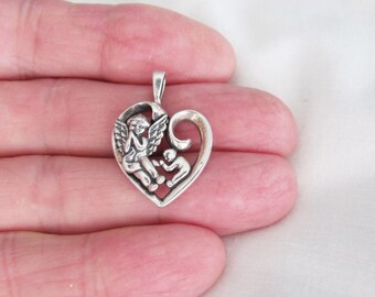 Sterling Silver 22mm Angel praying for baby heart pendant (Brand new)