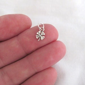 Very small Solid  Sterling Silver antiqued look lucky 4 leaf clover mini tiny charm. (Brand new)