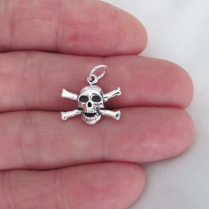 Solid Sterling Silver skull and cross bones charm (Brand new)