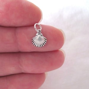 Very small Solid  Sterling Silver Seashell miniature charm. (Brand new)