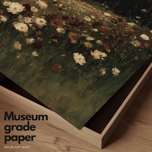 May include: A framed gicl&eacute;e art print featuring a field of flowers in shades of white, cream, and brown against a green background. The print is labeled "Museum grade paper" with "GICLEE ART PRINT" below it. The frame is made of light-colored wood.