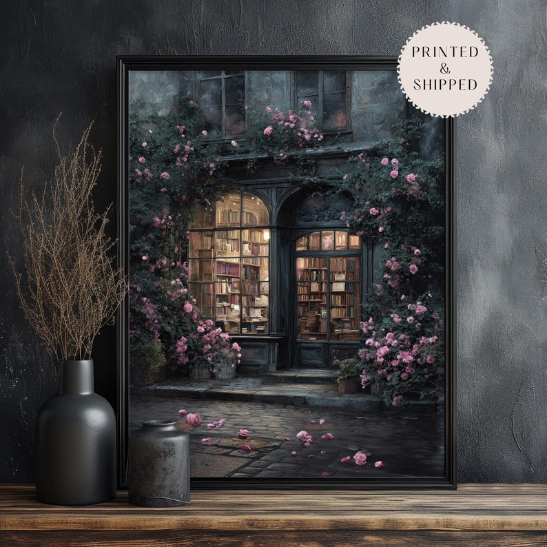May include: A framed print of a romantic bookstore scene. The image features a building with arched windows and doors, surrounded by climbing roses. The interior is filled with bookshelves and soft lighting. The print is labeled "PRINTED & SHIPPED".