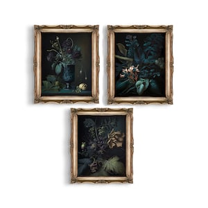 May include: Three framed botanical prints with dark green and black floral arrangements in ornate gold frames.