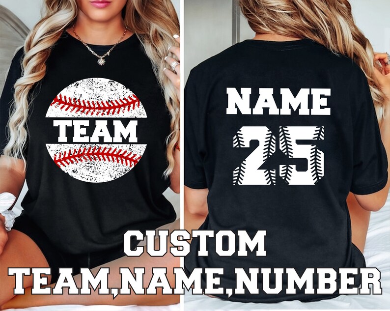 May include: Black t-shirt with a white baseball graphic and the text "TEAM" on the front. The back of the shirt has the text "NAME" and the number "25" in white.