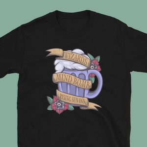 May include: Black t-shirt with a graphic of a purple beer mug with white foam and the text "Wizards Mind Bomb Rising Sun Inn".