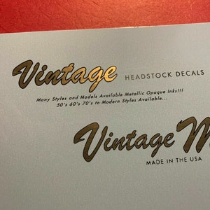 2 Vintage Custom Made and Reproduction Guitar Headstock Waterslide Decals  Real Metallic Gold and Black inks. 2 of the same decals per order