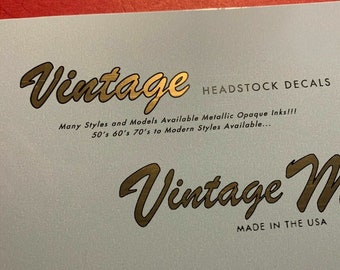 2 Vintage Custom Made and Reproduction Guitar Headstock Waterslide Decals  Real Metallic Gold and Black inks. 2 of the same decals per order