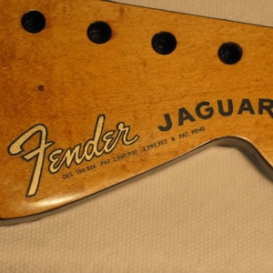 Two Fender Restoration Guitar Headstock Waterslide Decals Vintage Styles Real Metallic Gold and Black inks. Two per order Most famous styles