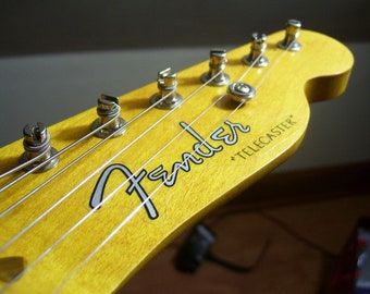 Two Vintage and Reproduction Fender Guitar Headstock Waterslide Decals  Real Metallic Gold and Black inks. Two per order Most famous styles!