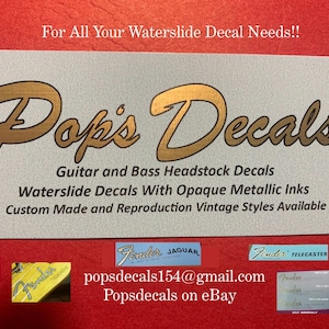 Two Restoration Guitar Headstock Waterslide Decals Vintage Styles Real Metallic Gold and Black inks. Two per order Most styles available!