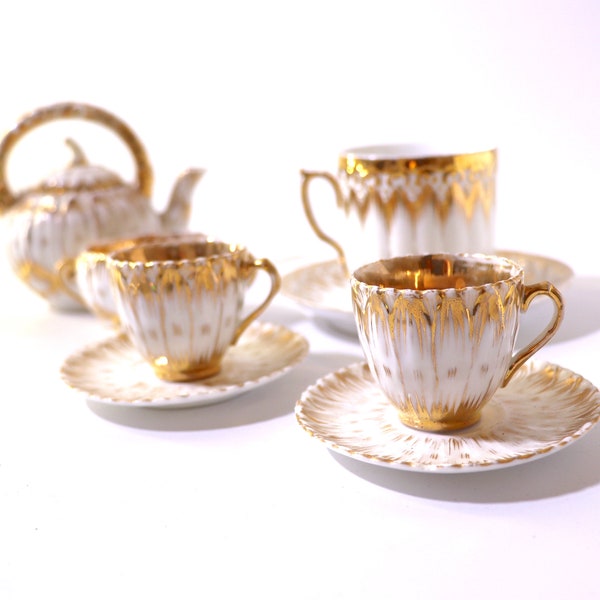 Antique Victorian White and Gold gilt Porcelain tea set, Partial set demitasse cups, tea cup & saucer, sugar bowl, floral teapot