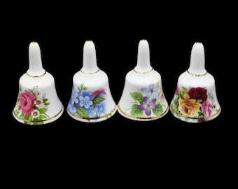 Campana de mesa de porcelana antigua: pieza de colección pintada a mano.
