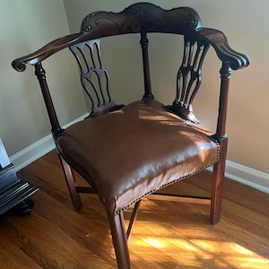 Vintage Corner Chair Mahogany Frame Brown Leather Seat Carved Back Elegant Accent Seating Classic Design Timeless Antique Home Decor Piece