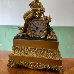 Antique French Early 19th Century Gilded Bronze Mantel Clock Antique Victorian Sculpture Ornate Floral Motifs Luxurious Bronze Mantel Clock
