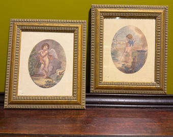 Par de láminas artísticas vintage de querubines con marcos dorados, ángel Cupido ovalado, arte de pared, decoración clásica de estilo neoclásico europeo.