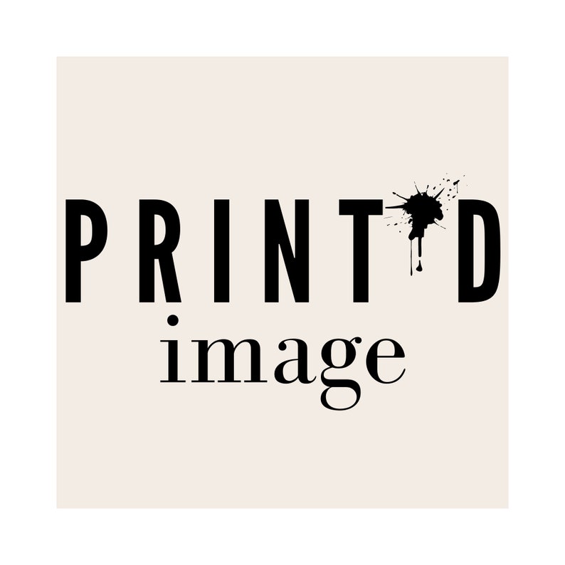 May include: Black and white text that reads "PRINTED image" with a black ink splatter above the "D" in "PRINTED".