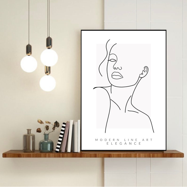 May include: Black and white line art print of a woman's face with the text "MODERN LINE ART ELEGANCE" at the bottom.