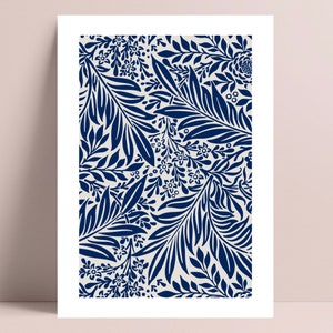 May include: A navy blue and white floral pattern print. The pattern features stylized leaves and flowers.