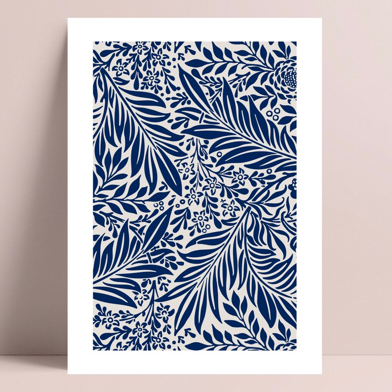 May include: A navy blue and white floral pattern print. The pattern features stylized leaves and flowers.