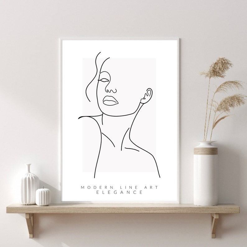 May include: A black and white line art print of a woman's face with the text "MODERN LINE ART ELEGANCE" at the bottom.
