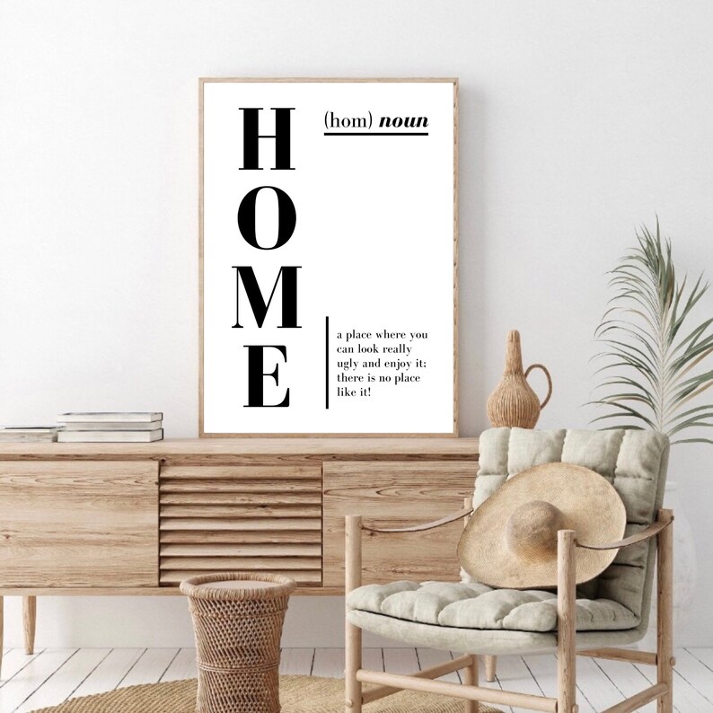 May include: Black and white printable wall art with the word "HOME" defined as "a place where you can look really ugly and enjoy it: there is no place like it!"